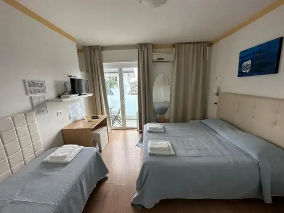Üç Kişilik Oda