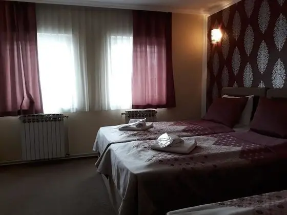 Üç Kişilik Oda