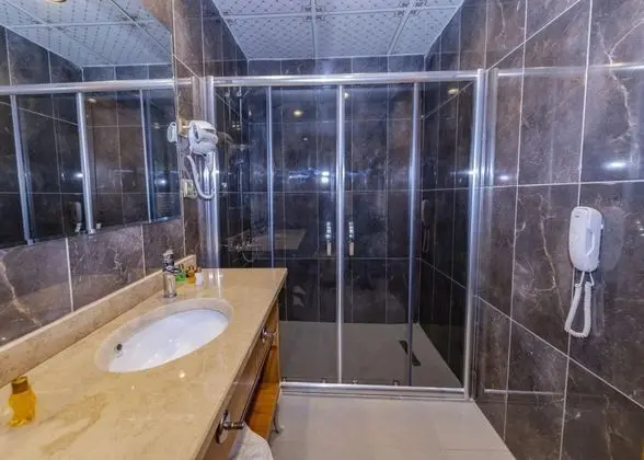 Üç Kişilik Oda, Bahçe Manzaralı, Balkonsuz
