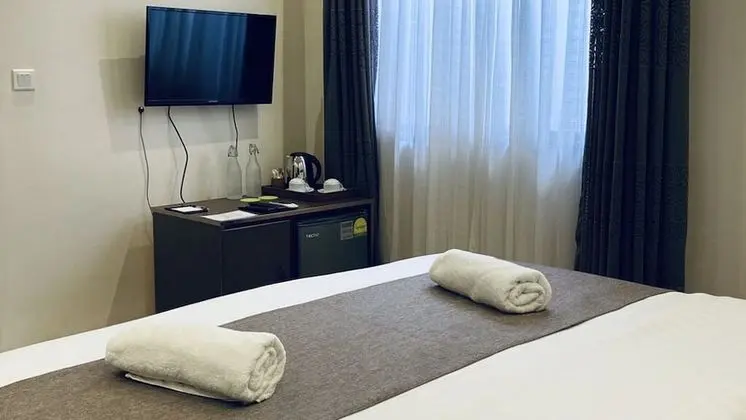 Deluxe Tek Büyük veya İki Ayrı Yataklı Oda