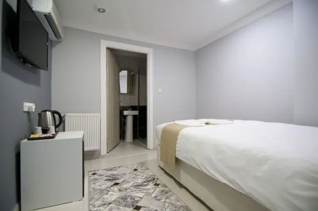 (A) Economy Double Room