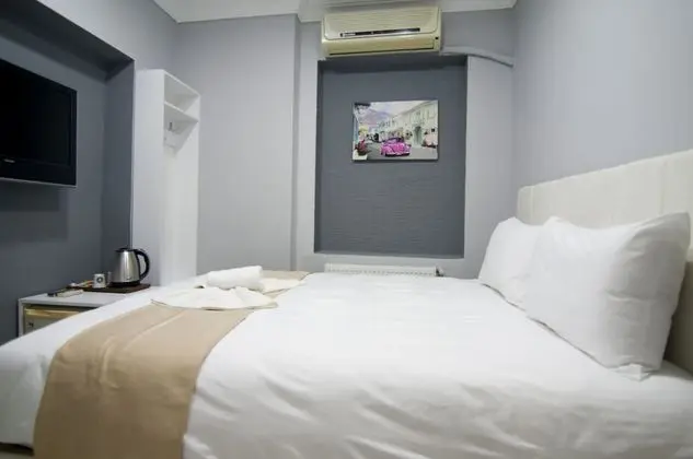 (A) Economy Double Room