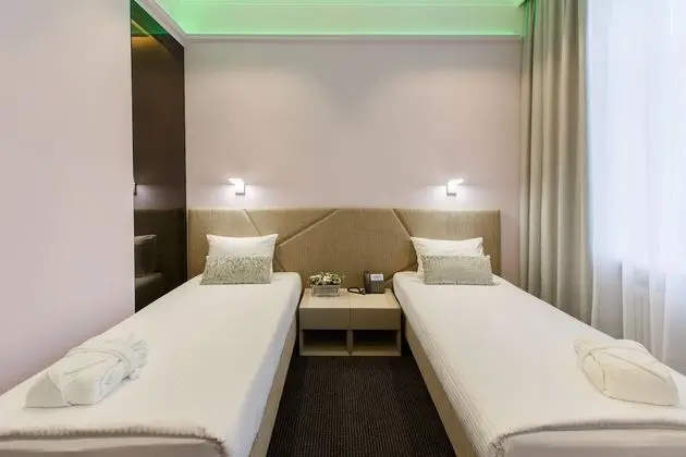 Comfort Tek Büyük veya İki Ayrı Yataklı Oda