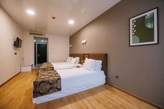 Üç Kişilik Oda