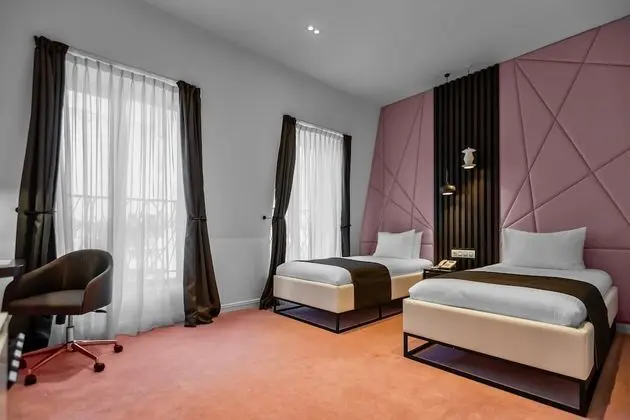 Comfort Tek Büyük veya İki Ayrı Yataklı Oda