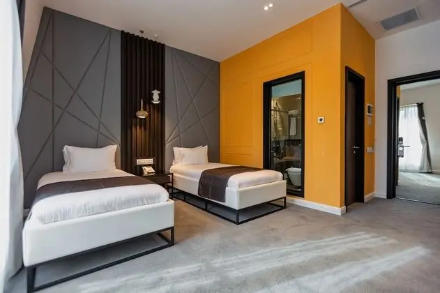 Comfort Tek Büyük veya İki Ayrı Yataklı Oda