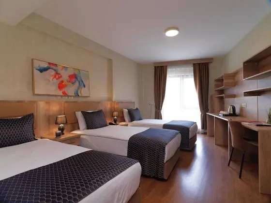 Deluxe Üç Kişilik Oda