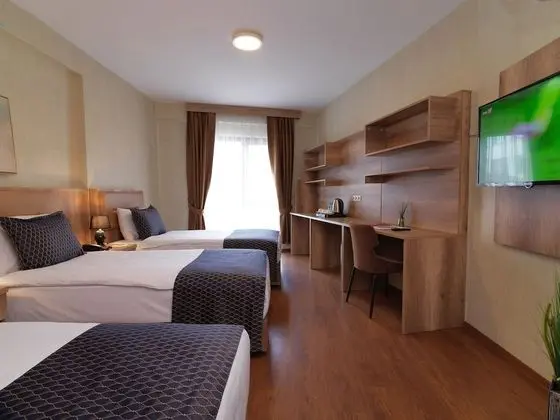 Deluxe Üç Kişilik Oda