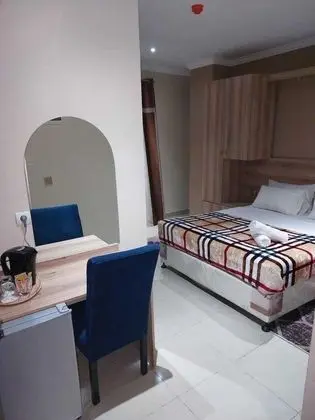 Premium Tek Büyük Yataklı Oda