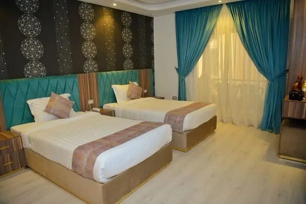 Deluxe Tek Büyük veya İki Ayrı Yataklı Oda