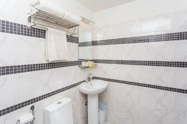 Deluxe Tek Büyük veya İki Ayrı Yataklı Oda