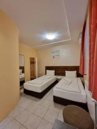 Economy Tek Büyük veya İki Ayrı Yataklı Oda