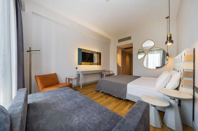 https://images.odamax.com/img/1024x768/odamax/image/upload/Jiva_Beach_Resort_Hotel_202601221535539_Standart_Room_5.png