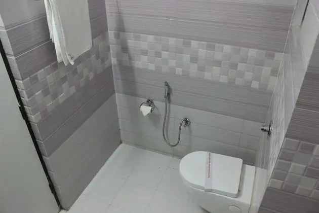 Deluxe Tek Büyük veya İki Ayrı Yataklı Oda