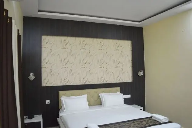 Deluxe Tek Büyük veya İki Ayrı Yataklı Oda, Koy Manzaralı