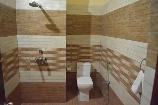Deluxe Tek Büyük veya İki Ayrı Yataklı Oda, Koy Manzaralı