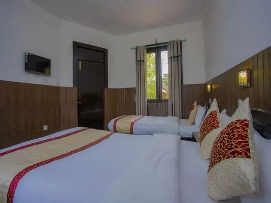 Deluxe Tek Büyük veya İki Ayrı Yataklı Oda