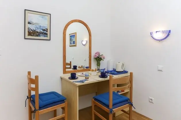 Tek Büyük veya İki Ayrı Yataklı Oda, Bahçe Manzaralı
