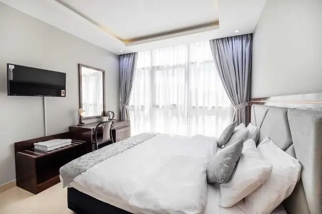 Deluxe Tek Büyük veya İki Ayrı Yataklı Oda