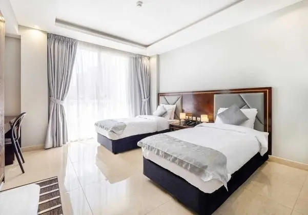 Deluxe Tek Büyük veya İki Ayrı Yataklı Oda