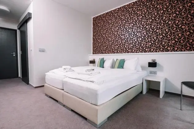 Deluxe Tek Büyük veya İki Ayrı Yataklı Oda