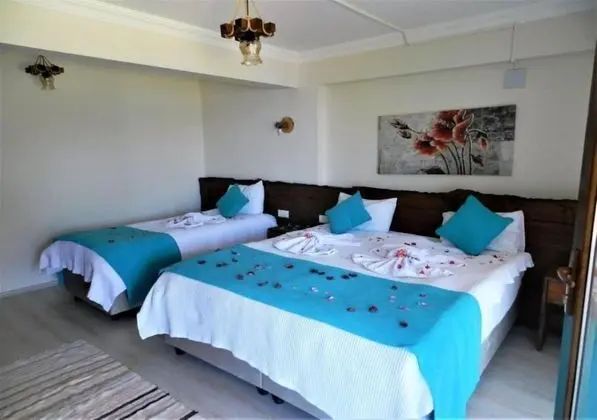 Deluxe Üç Kişilik Oda