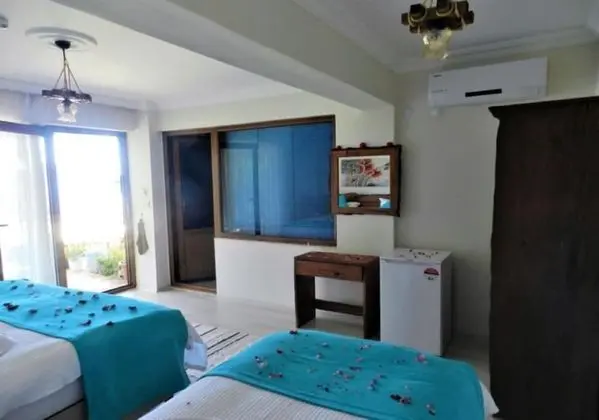 Deluxe Üç Kişilik Oda