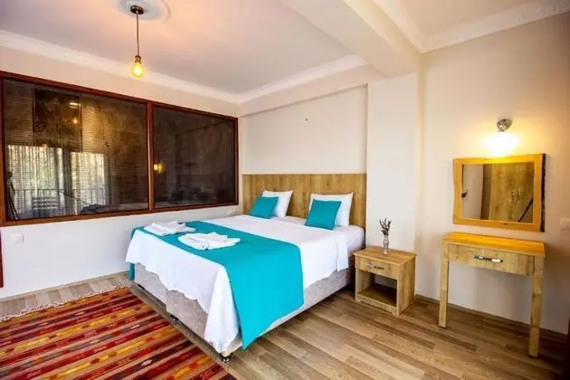 Deluxe Üç Kişilik Oda