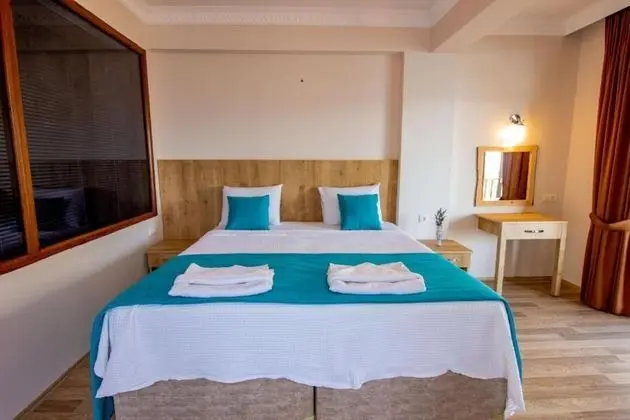 Deluxe Üç Kişilik Oda