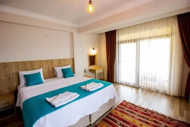 Deluxe Üç Kişilik Oda