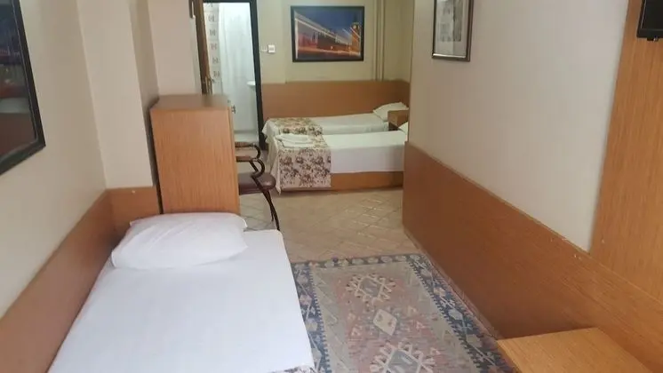 Üç Kişilik Oda
