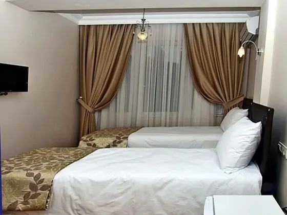 Tek Büyük veya İki Ayrı Yataklı Oda