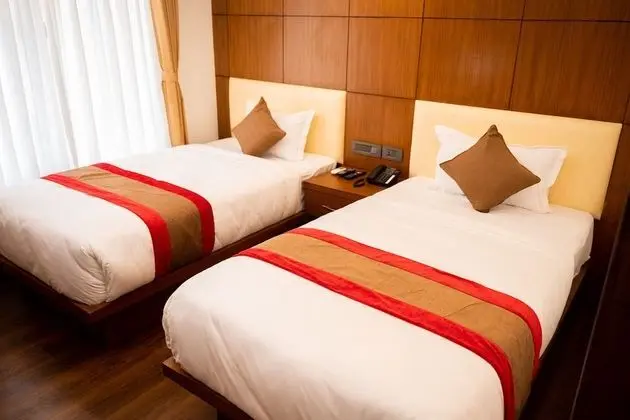 Deluxe Tek Büyük veya İki Ayrı Yataklı Oda