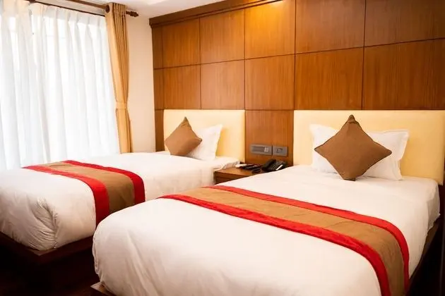 Deluxe Tek Büyük veya İki Ayrı Yataklı Oda