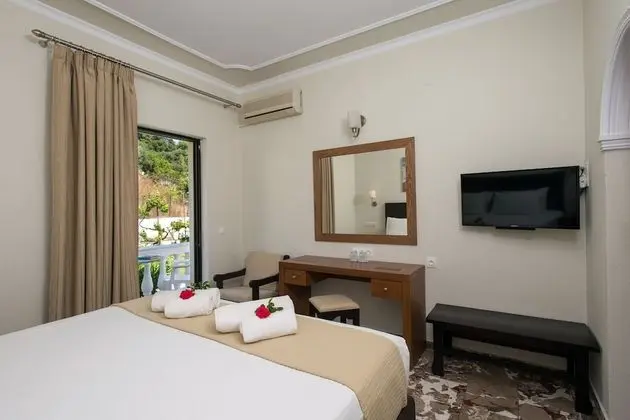 Standard Tek Büyük veya İki Ayrı Yataklı Oda (Mountain view or Garden view)