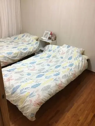 İki Ayrı Yataklı Oda, Ortak Banyo