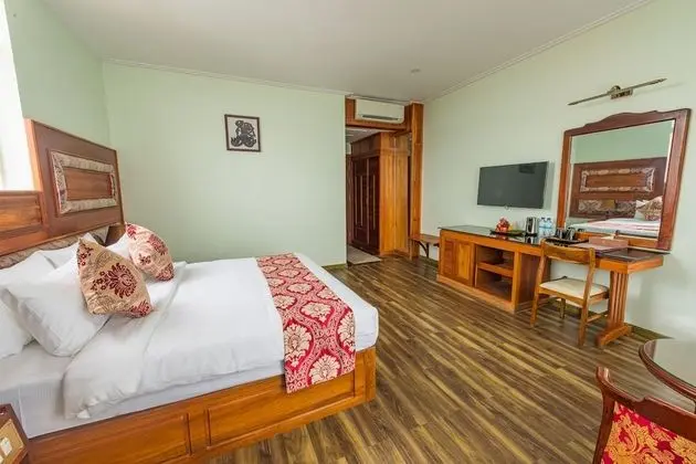 Deluxe Tek Büyük veya İki Ayrı Yataklı Oda