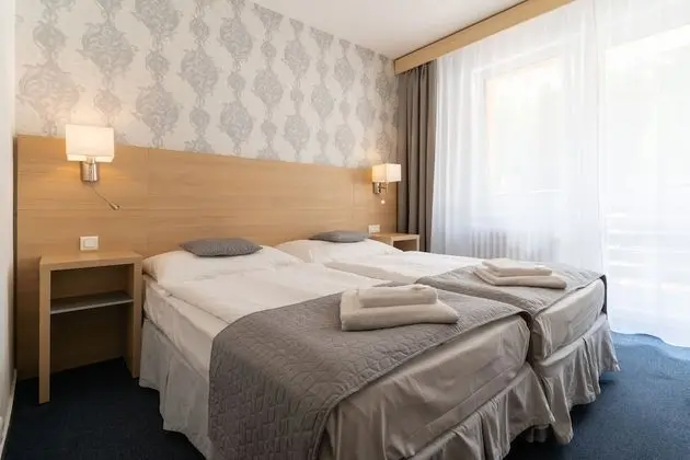 Classic Tek Büyük veya İki Ayrı Yataklı Oda