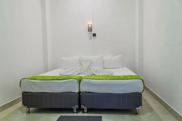 Basic Tek Büyük veya İki Ayrı Yataklı Oda