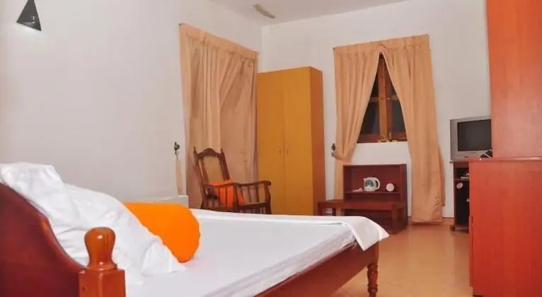 Forest Side Room with attached Bathroom and AC