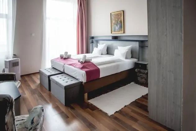 Deluxe Tek Büyük veya İki Ayrı Yataklı Oda