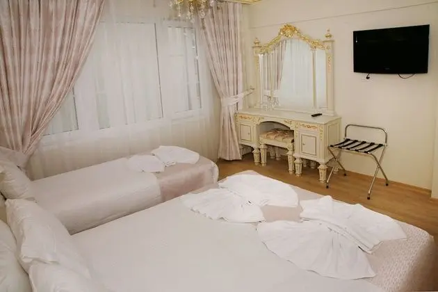 Üç Kişilik Oda