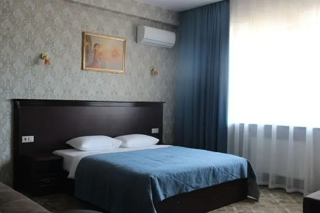 Family Tek Büyük veya İki Ayrı Yataklı Oda