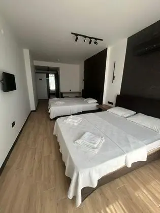 Ekonomik Üç Kişilik Oda, Bahçe Manzaralı, Balkonsuz