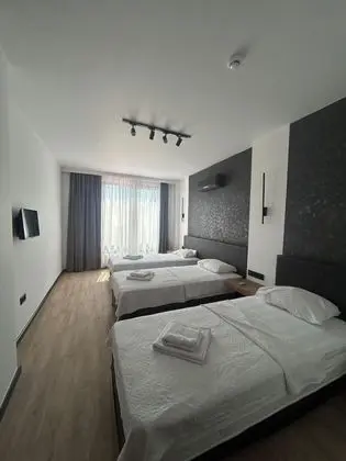 Ekonomik Üç Kişilik Oda, Bahçe Manzaralı, Balkonsuz