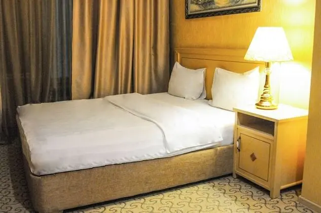 Economy Tek Büyük veya İki Ayrı Yataklı Oda