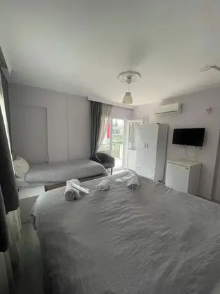 Balkonlu Standart üç kişilik oda
