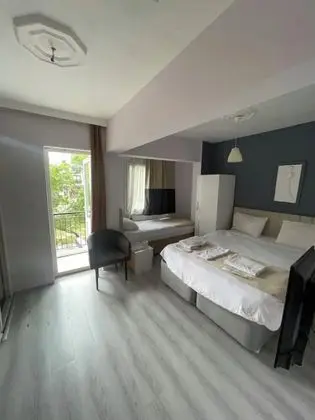 Balkonlu Standart üç kişilik oda