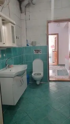Daire-İKi Yatak Odalı,Bahçe Manzaralı,1. Kat