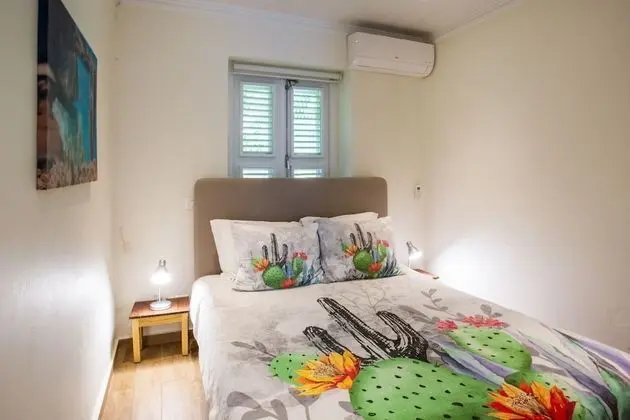 Cozy Cactus ground floor one bedroom apartment, with terrace and shared plunge pool